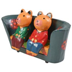  2 bears on a floral sofa hand carved Albesia wood, 15 x 8 x 4cm